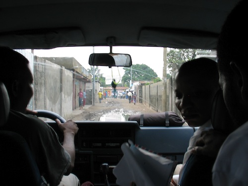 Showing Some of the Dirt Roads with Mud Holes in the Street.